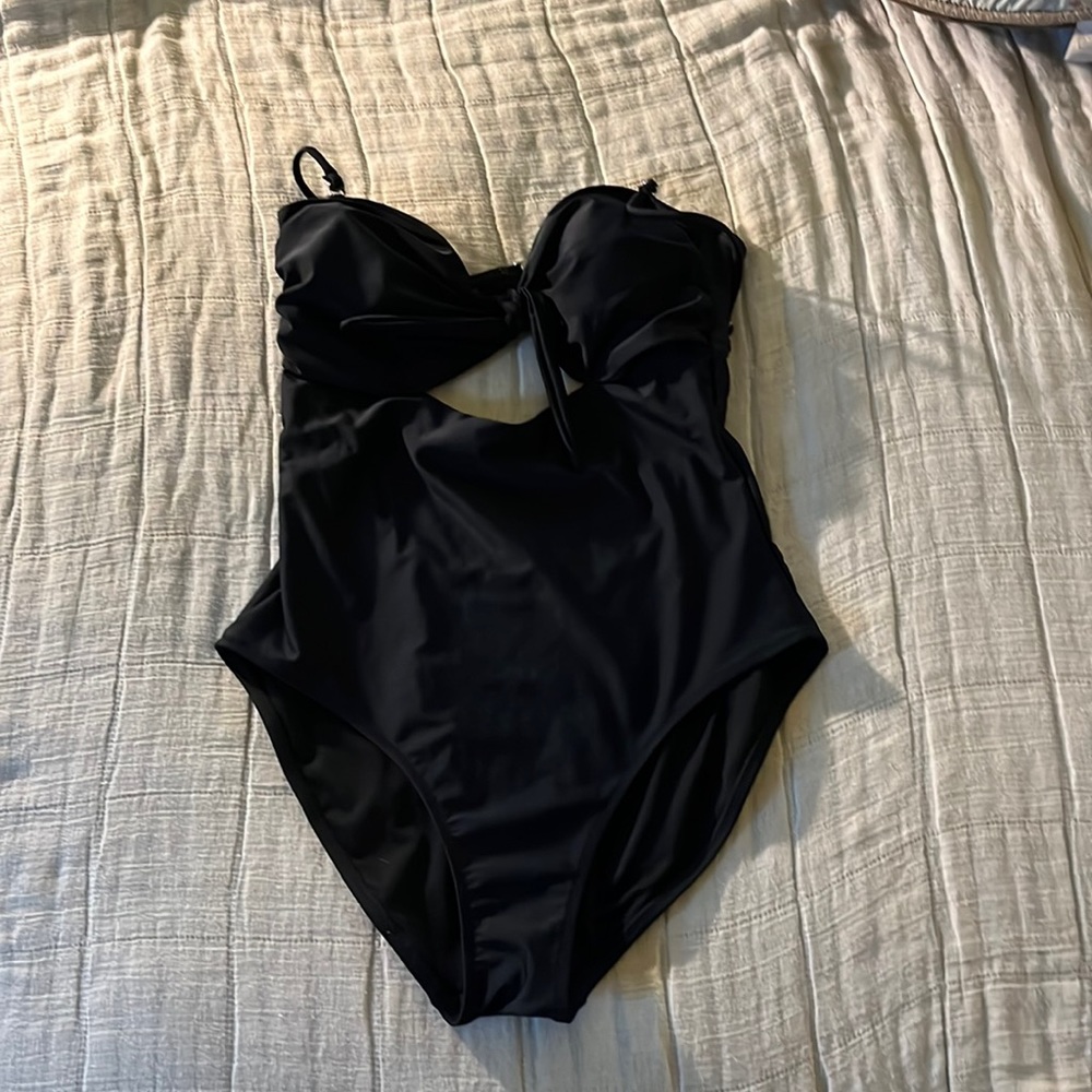 Black one piece swimsuit.